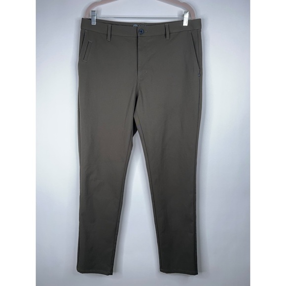 Vuori Cascade Tech Chino Pant Athletic Slim Fit Dark Oregano Green Size 34 - Picture 1 of 11